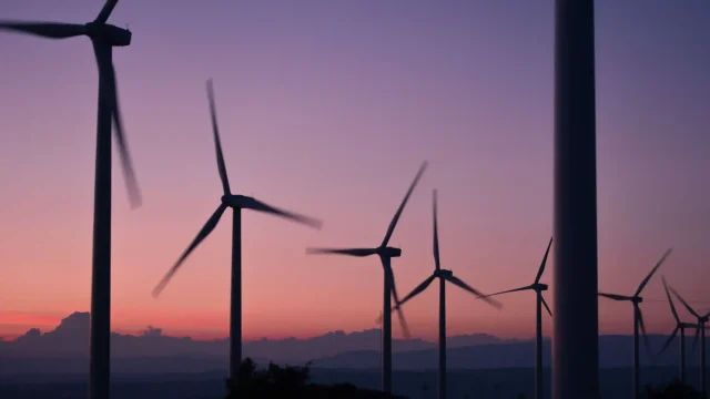 1667801621-silhouette of wind turbines during sunset